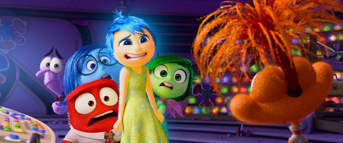 Joy, Sadness, Anger, Disgust, and Fear look uncomfortably at a new emotion, Anxiety, in Pixar Animation Studios’ Inside Out 2