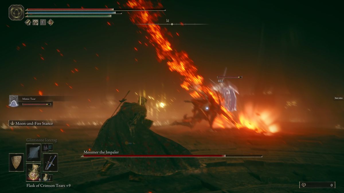 Messmer the Impaler sends a giant blade of flame toward an Elden Ring DLC player during a boss fight.