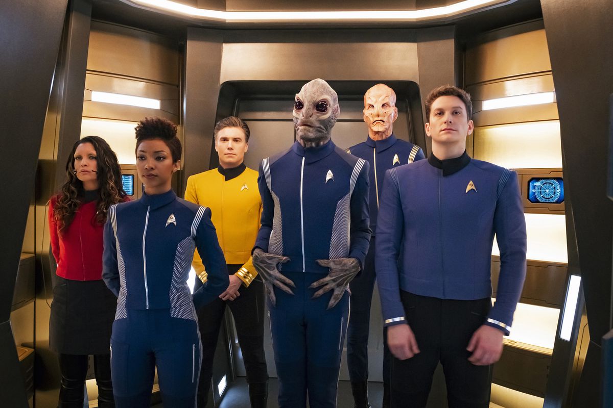 Lt. Nhan (Rachael Ancheril); Michael Burnham (Sonequa Martin-Green); Captain Pike (Anson Mount); Linus (David Benjamin Tomlinson); Saru (Doug Jones); and Lt. Connolly (Sean Connolly Affleck), all standing in an elevator on the ship